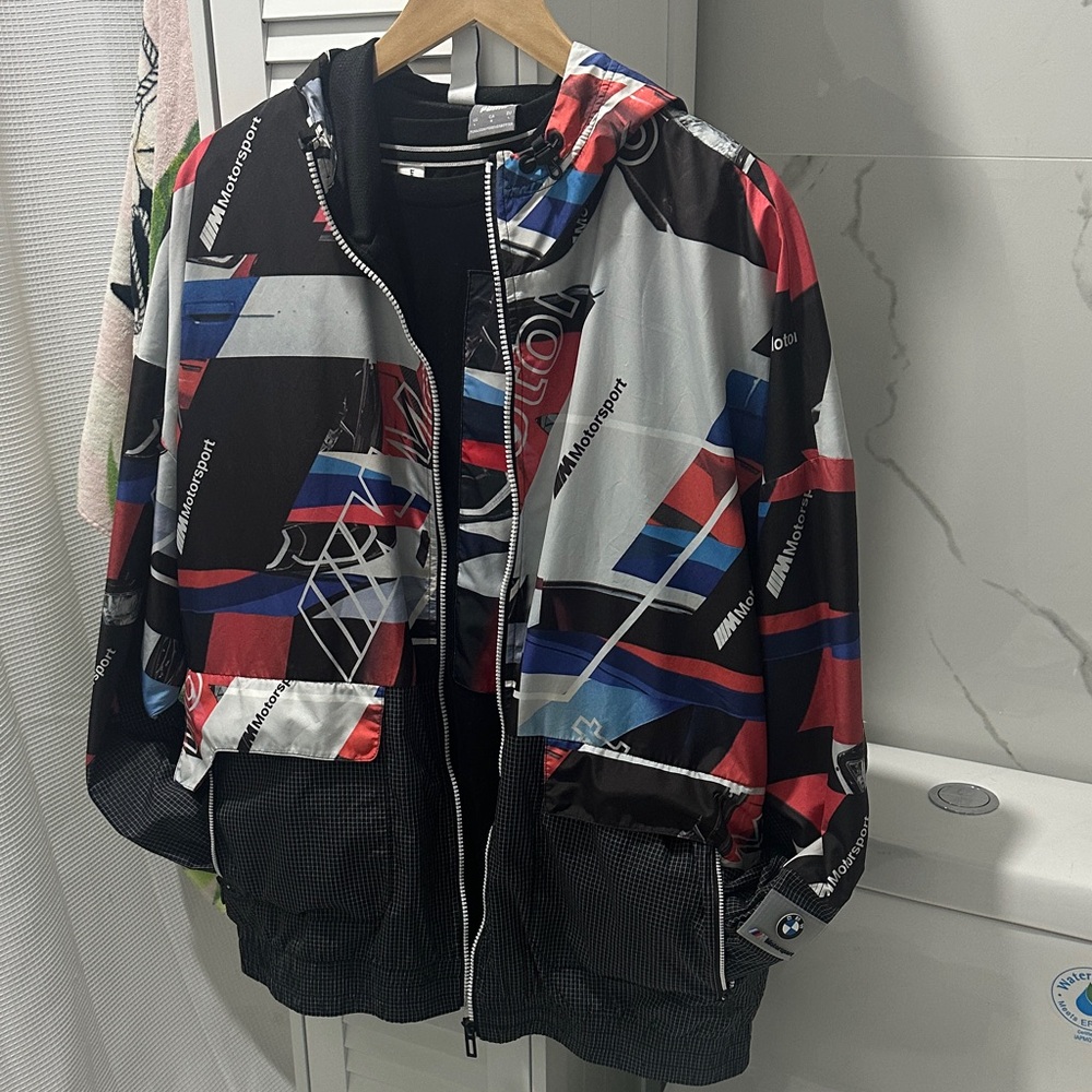 Puma Men's Black and Red Graphic Windbreaker